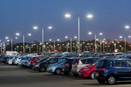 Parking lot of international airport enlightened by LEDs